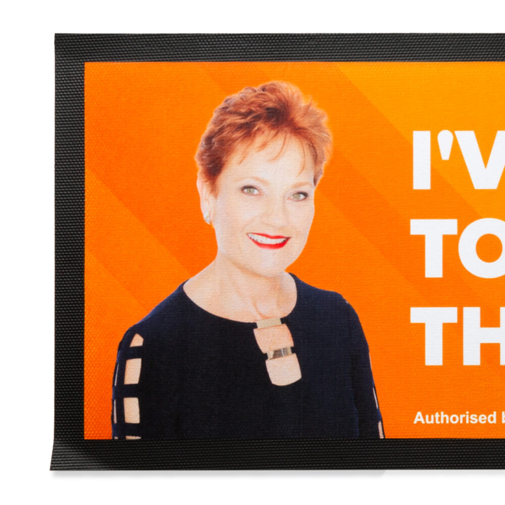 Close-up of the bar runner with a photo of Pauline Hanson and the start of the slogan