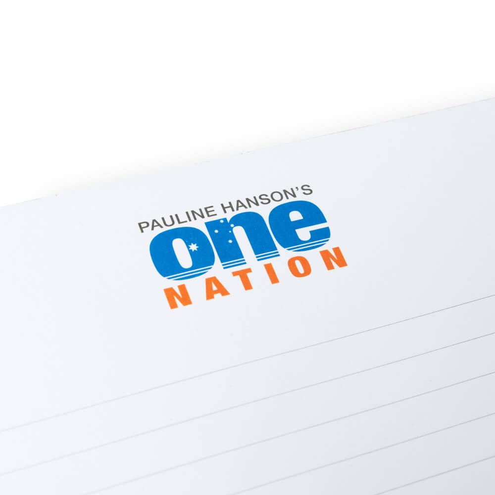 Close-up of the blue and orange Pauline Hanson’s One Nation logo on the note pad