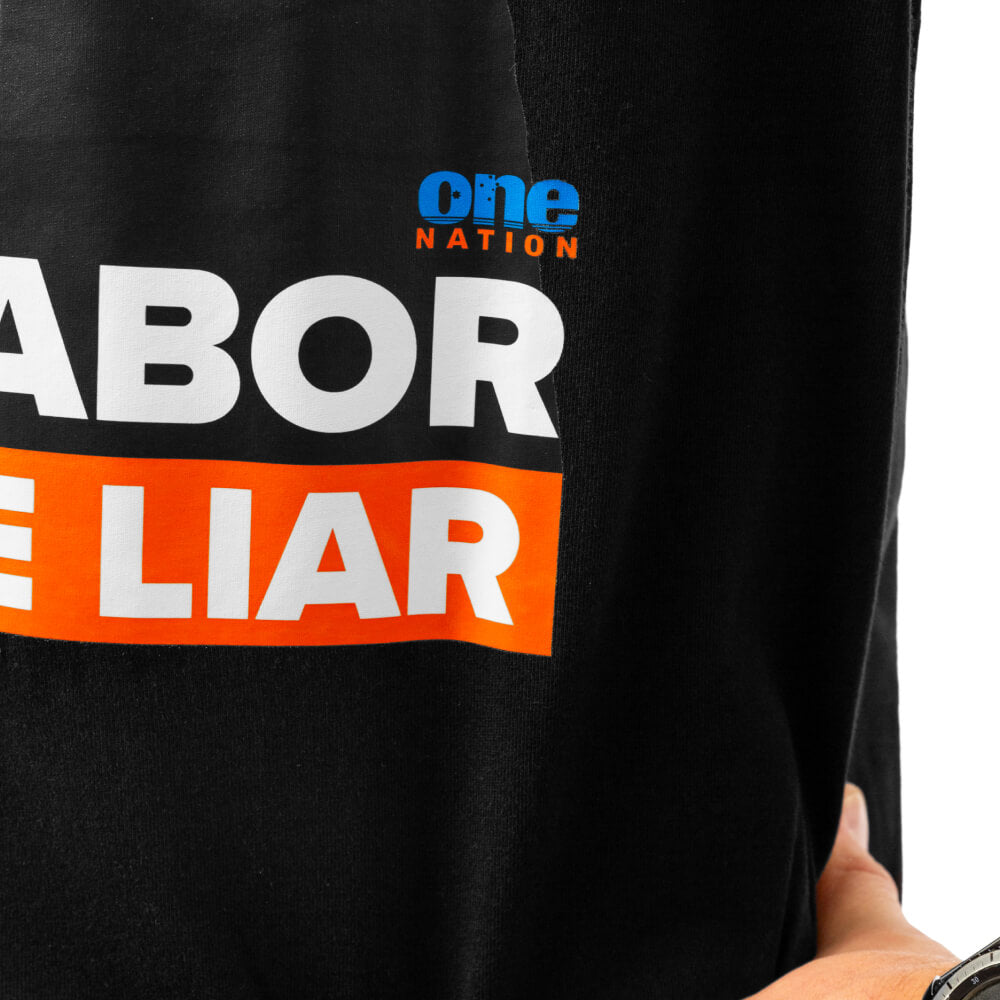 Close-up of the “Stop Labor – Fire The Liar” print and One Nation logo