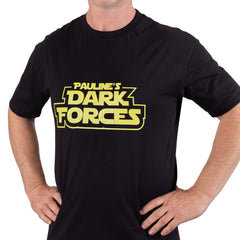 Man wearing the black “Pauline’s Dark Forces” T-shirt with yellow lettering