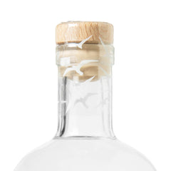 Close-up of the Christmas Spirit Gin bottle’s timber-topped cork stopper