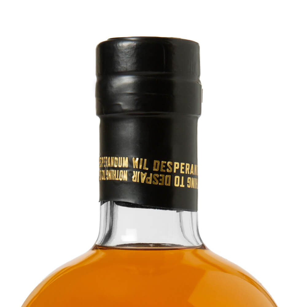 Close-up of the Director’s Batch bottle’s black-capped neck